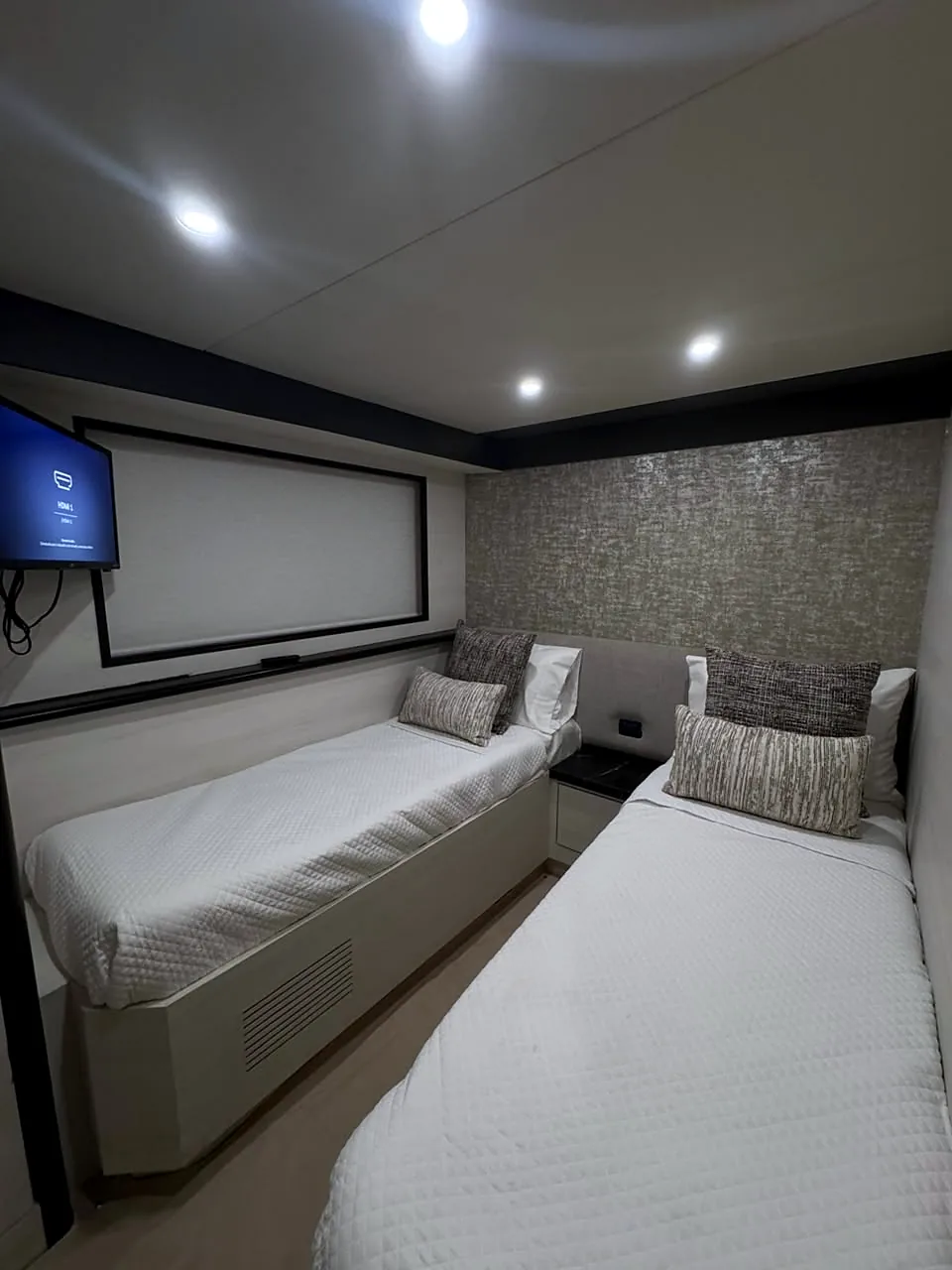 Twin-bed stateroom viewed from the side