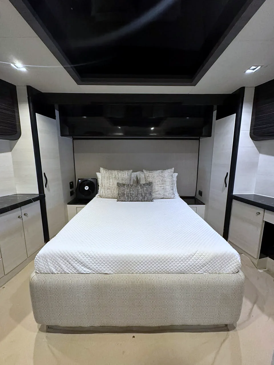 Double-bed stateroom viewed from the foot of the bed