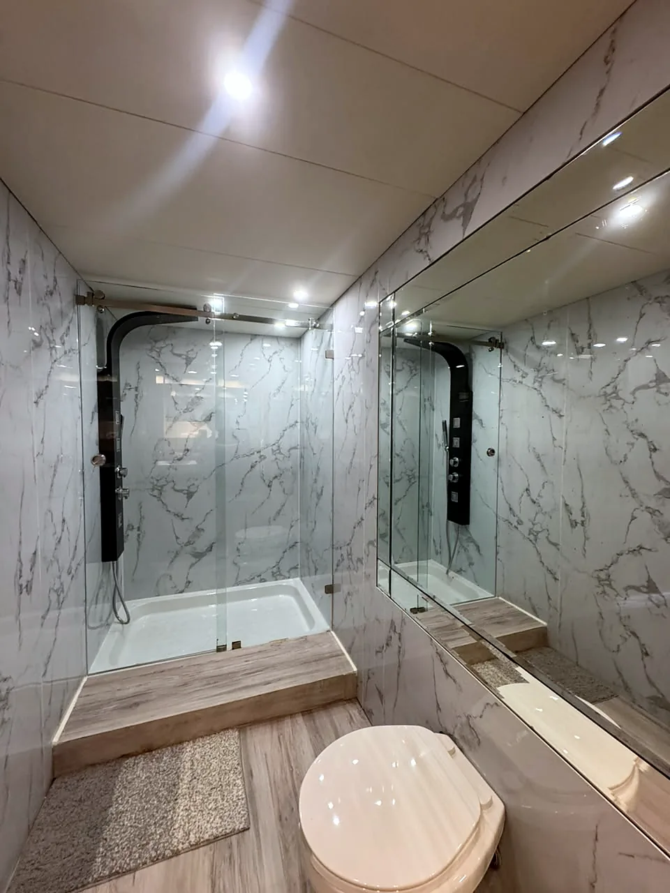 Marble bathroom with shower aboard MÍO
